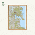 A framed topographical map print of Whangārei