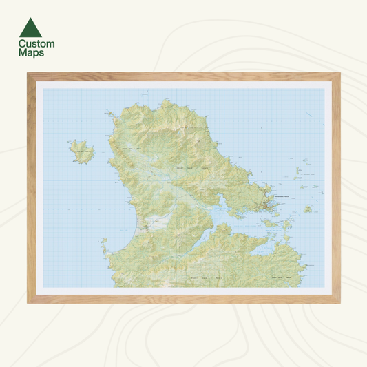 Map of Stewart Island and the Rakiura track with a wooden frame on a white background.