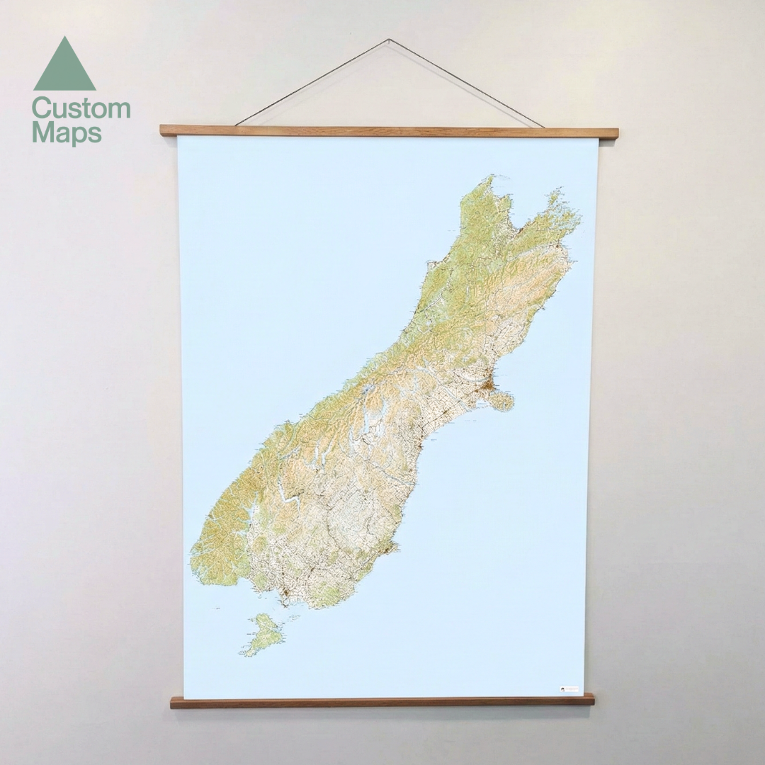 Wooden map frame with a topographic map of New Zealand.