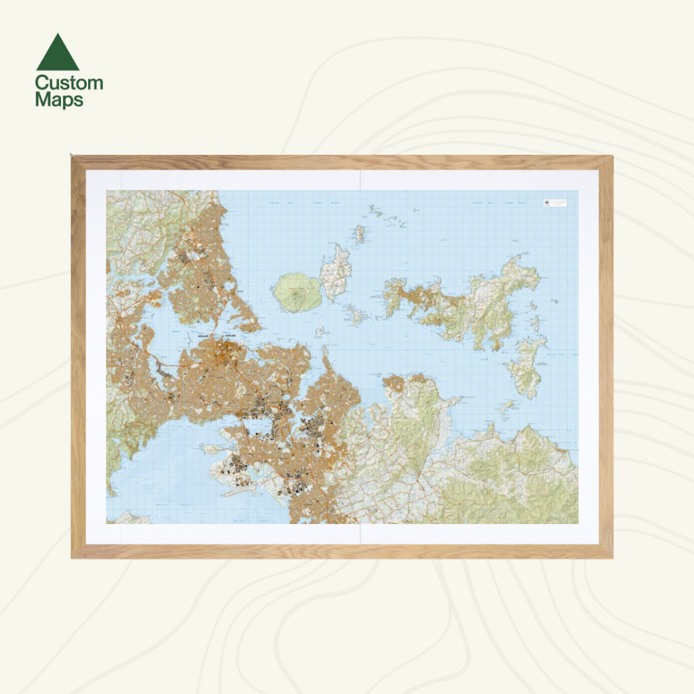 Framed map of Auckland with a light wood frame on a white background