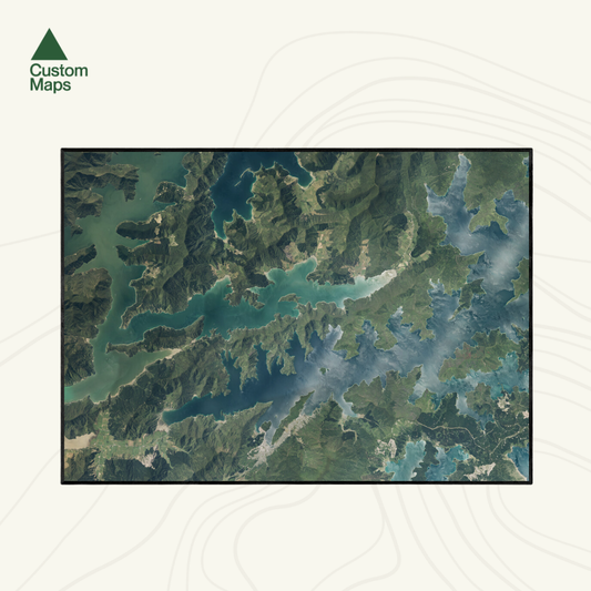 Aerial image of a landscape with water bodies and greenery