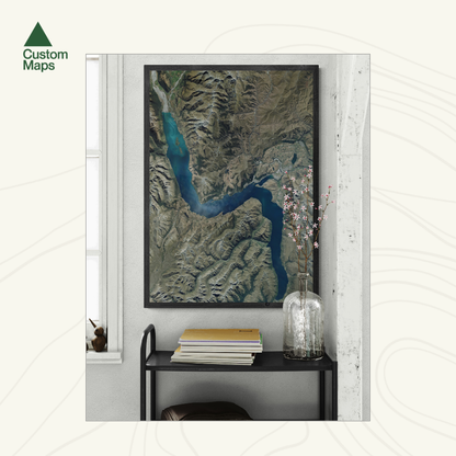 Framed aerial map of Queenstown in a modern interior setting.