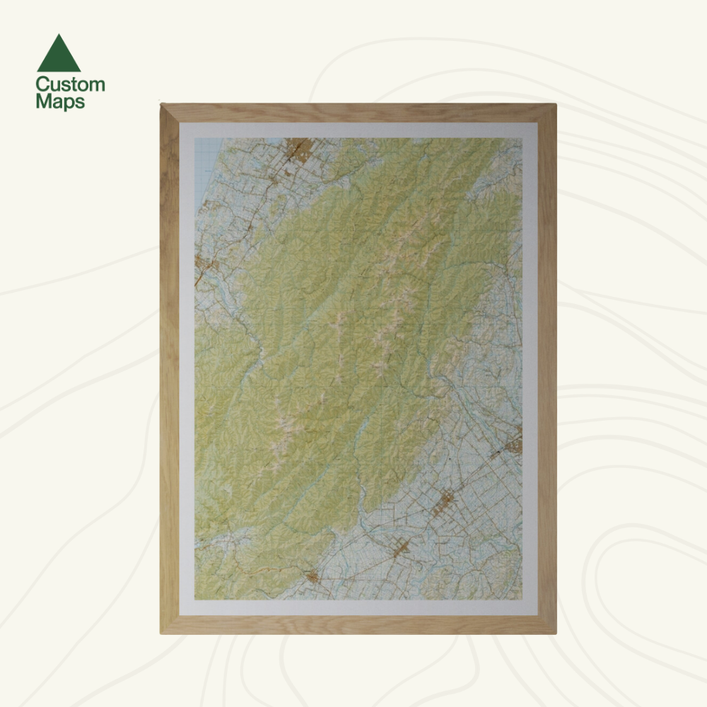 Framed topographic map with 'Custom Maps' logo in the corner