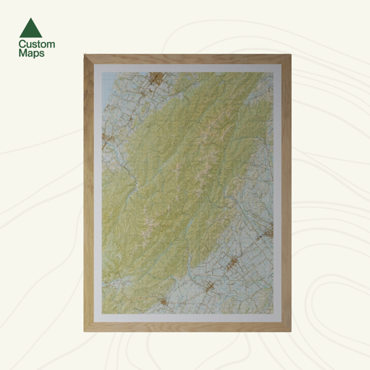 Framed topographic map with 'Custom Maps' logo in the corner